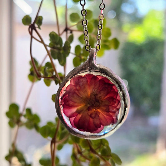 Pressed flower glass pendant
